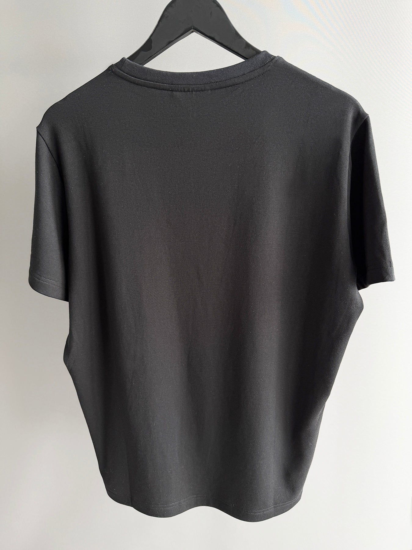 All black crew neck in black no contrast topstitching
