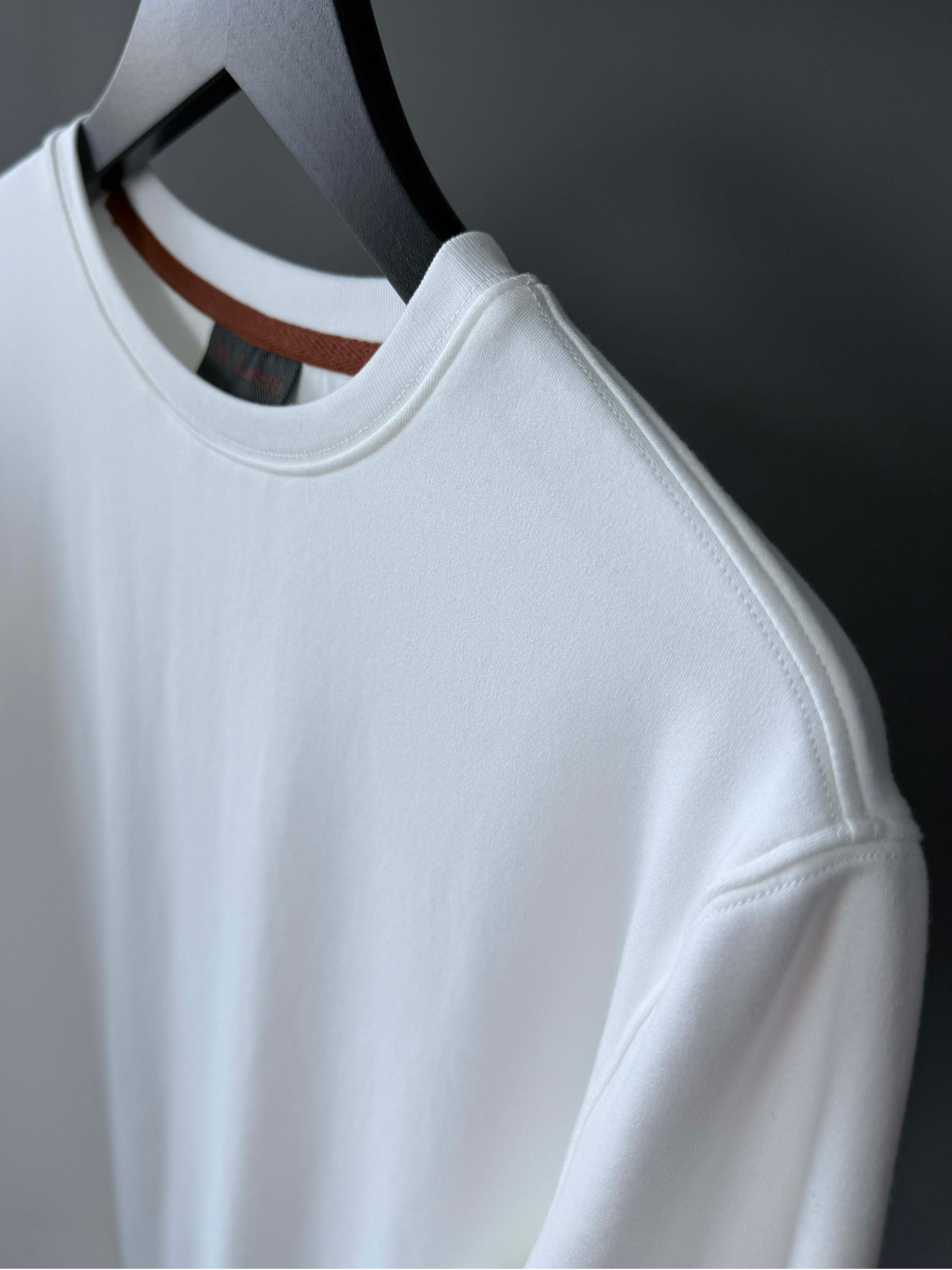 Off white with matching topstitching standard tee